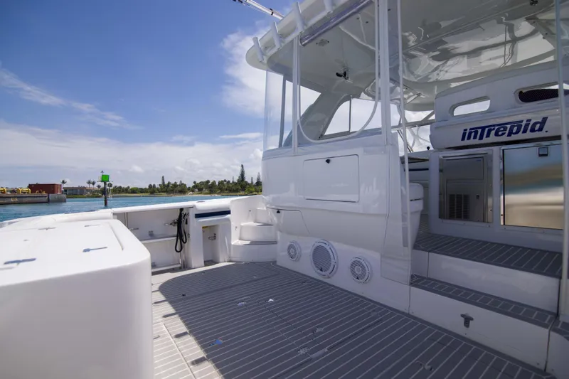Sunkisser Yacht Photos Pics 2013 Intrepid 475 Sport Yacht deck with sleek design and ocean view.