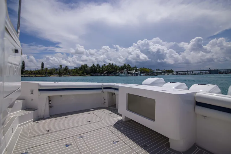 Sunkisser Yacht Photos Pics 2013 Intrepid 475 Sport Yacht deck with scenic ocean view.