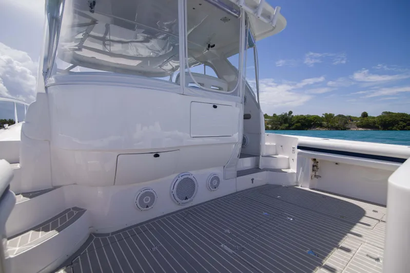 Sunkisser Yacht Photos Pics 2013 Intrepid 475 Sport Yacht deck with sleek design and ocean view.