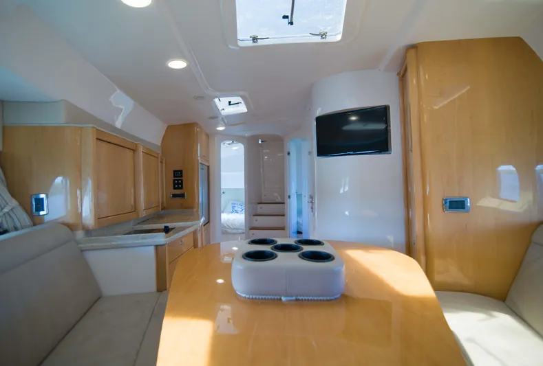 Sunkisser Yacht Photos Pics Luxurious interior of 2013 Intrepid 475 Sport Yacht with modern amenities and sleek design.