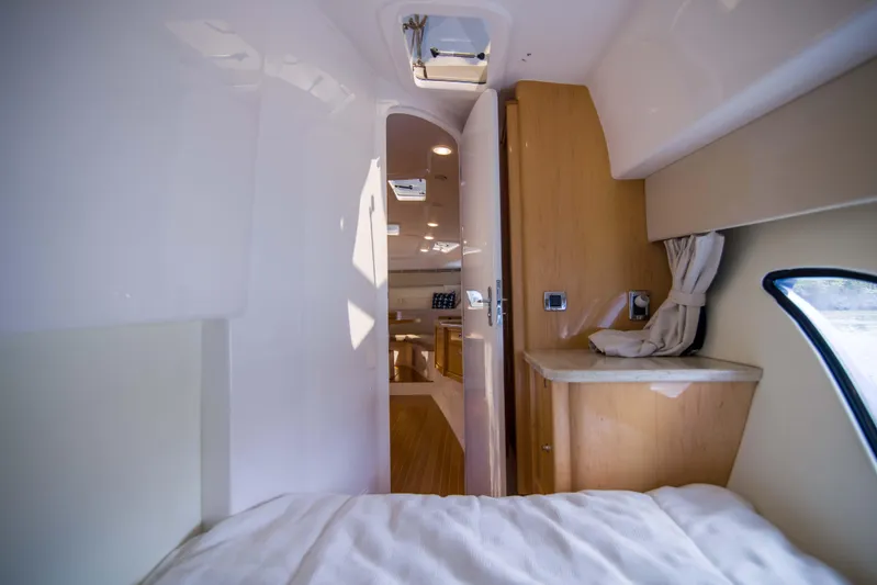 Sunkisser Yacht Photos Pics Interior view of 2013 Intrepid 475 Sport Yacht cabin with modern design.