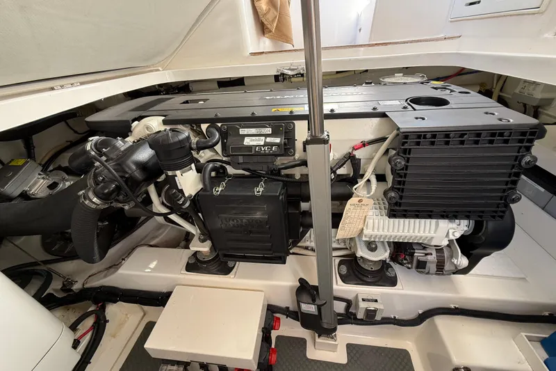  Yacht Photos Pics Engine compartment of 2017 Grand Banks 44 Eastbay SX, showcasing a Volvo Penta engine.