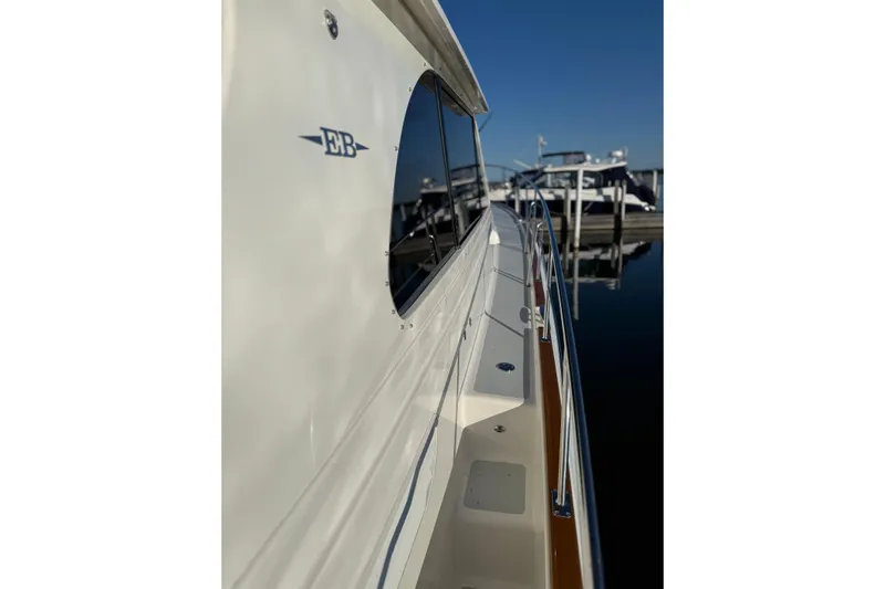  Yacht Photos Pics 2017 Grand Banks 44 Eastbay SX yacht docked, showcasing sleek design and polished exterior.