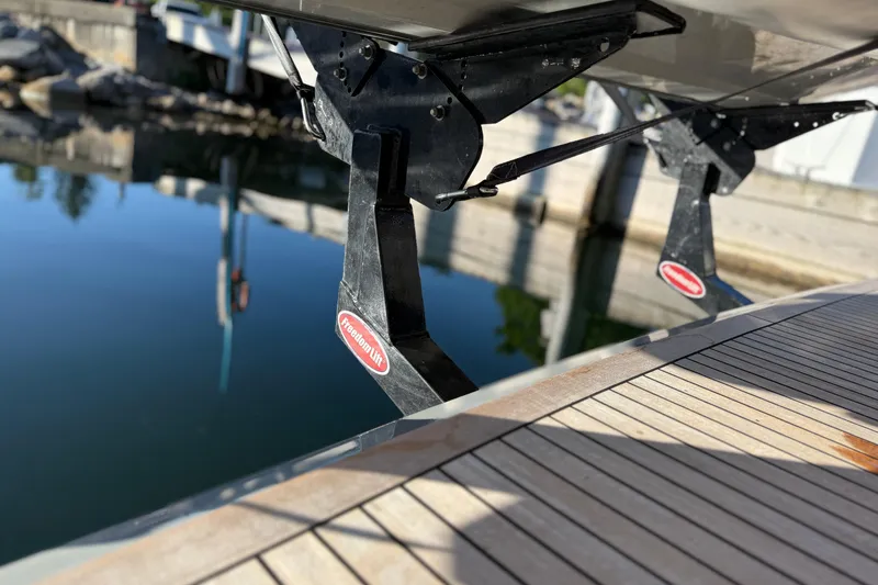  Yacht Photos Pics 2017 Grand Banks 44 Eastbay SX boat with Freedom Lift system at dock.