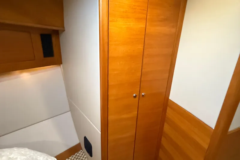  Yacht Photos Pics 2017 Grand Banks 44 Eastbay SX interior with wooden cabinetry and modern design.