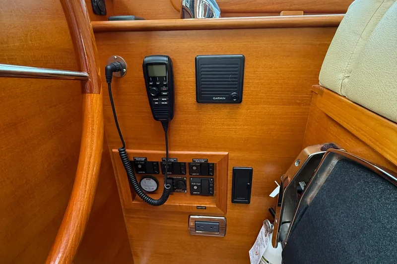  Yacht Photos Pics Control panel of 2017 Grand Banks 44 Eastbay SX with communication and navigation equipment.