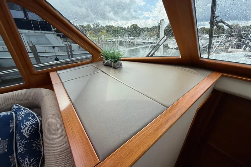  Yacht Photos Pics Interior of 2017 Grand Banks 44 Eastbay SX with elegant wood trim and plush seating.