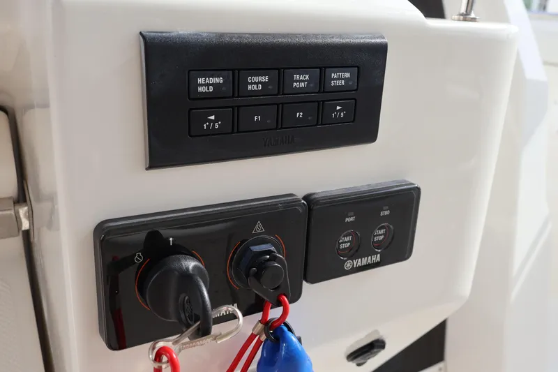  Yacht Photos Pics Control panel of 2021 Pursuit S 328 Sport boat with Yamaha controls.