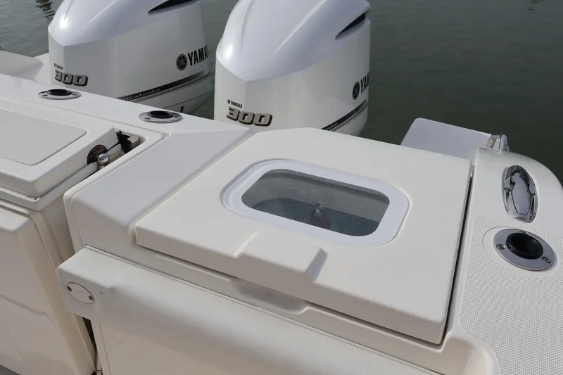  Yacht Photos Pics 2021 Pursuit S 328 Sport boat with Yamaha 300 engines, featuring a sleek deck design.