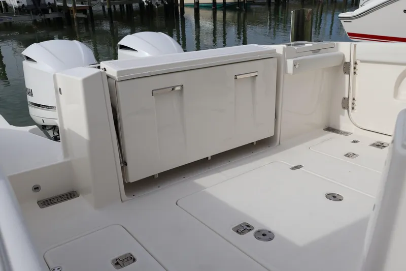  Yacht Photos Pics 2021 Pursuit S 328 Sport boat deck with dual Yamaha outboard engines.