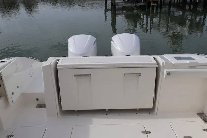  Yacht Photos Pics 2021 Pursuit S 328 Sport boat with dual engines and rear deck view.