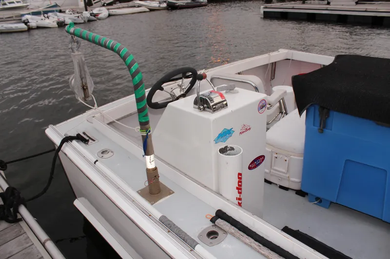 Bad Habits Yacht Photos Pics 2002 Libby 38 Downeast boat interior with steering console and docked at marina.