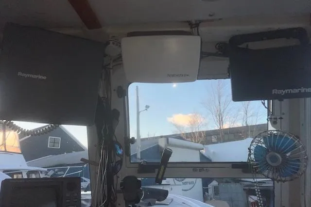 Bad Habits Yacht Photos Pics Interior view of a 2002 Libby 38 Downeast boat with Raymarine equipment.