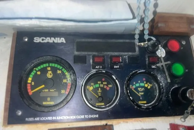 Bad Habits Yacht Photos Pics Control panel of a 2002 Libby 38 Downeast boat with Scania gauges and indicators.