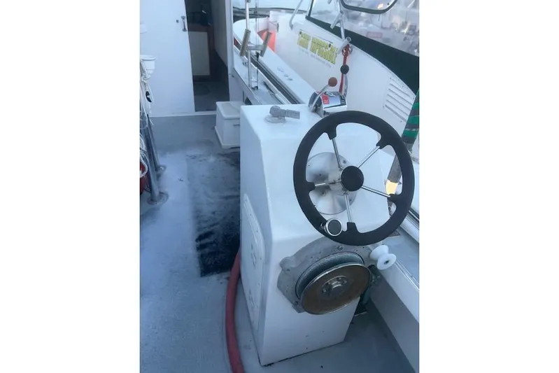 Bad Habits Yacht Photos Pics 2002 Libby 38 Downeast boat helm with steering wheel and controls.