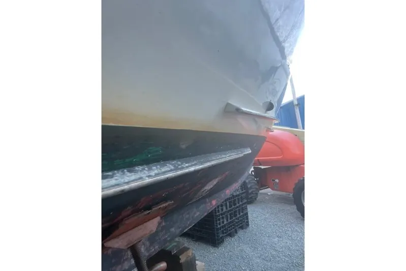 Bad Habits Yacht Photos Pics 2002 Libby 38 Downeast boat hull on dry dock, showing underside details.