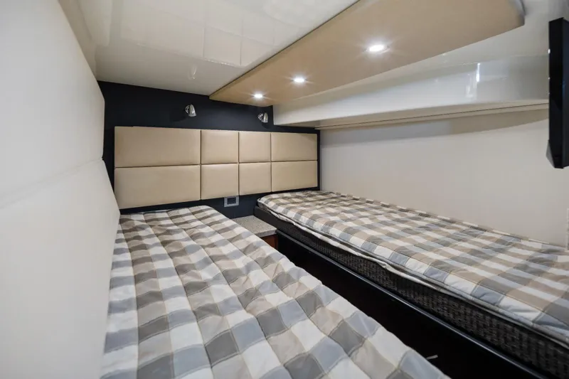 Yacht Photos Pics Interior cabin of 2012 Monterey 400 Sport Yacht with twin beds and modern lighting.