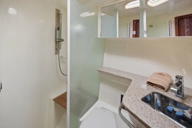  Yacht Photos Pics Luxurious bathroom in 2012 Monterey 400 Sport Yacht with modern fixtures and elegant design.