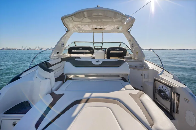  Yacht Photos Pics 2012 Monterey 400 Sport Yacht interior with sunlit seating and ocean view.