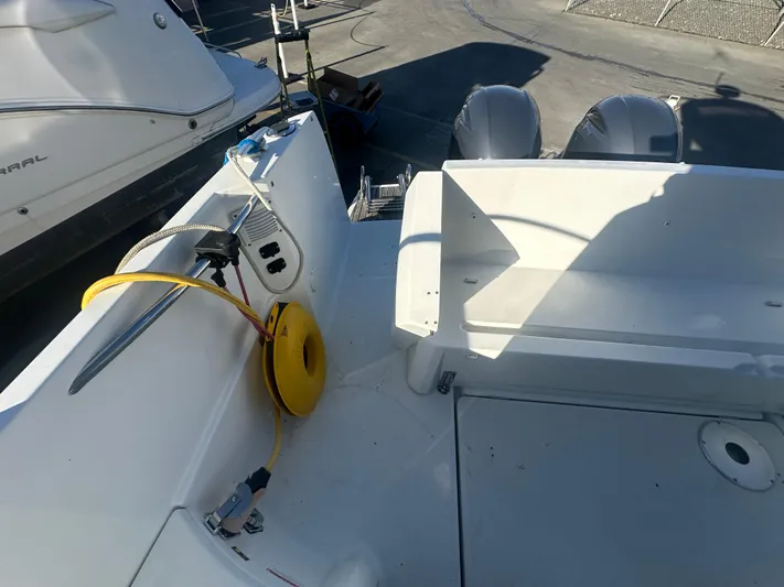 Marking Time Yacht Photos Pics 2016 Jeanneau Merry Fisher 855 boat deck with equipment and dual engines.