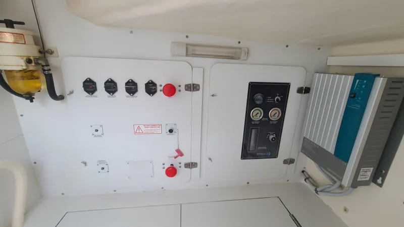 Pono Yacht Photos Pics Electrical panel and controls inside a 2005 Fountaine Pajot FP Eleuthera 60 catamaran.
