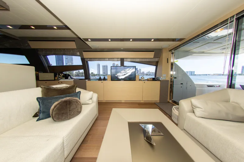  Yacht Photos Pics Luxurious interior of 2015 Ferretti Yachts 750 with modern furnishings and cityscape view.