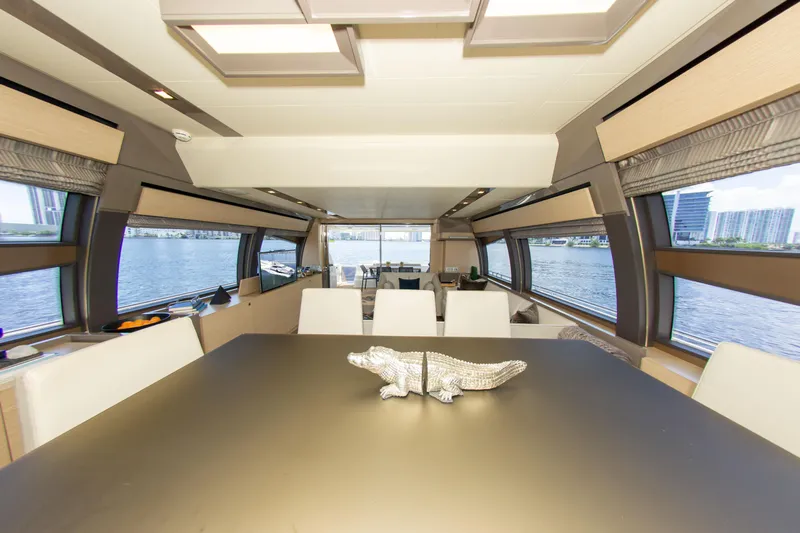  Yacht Photos Pics Luxurious interior of 2015 Ferretti Yachts 750 with elegant dining area and waterfront view.