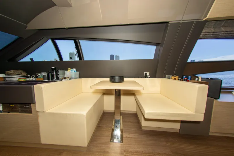  Yacht Photos Pics Luxurious interior of 2015 Ferretti Yachts 750 with elegant seating and panoramic windows.