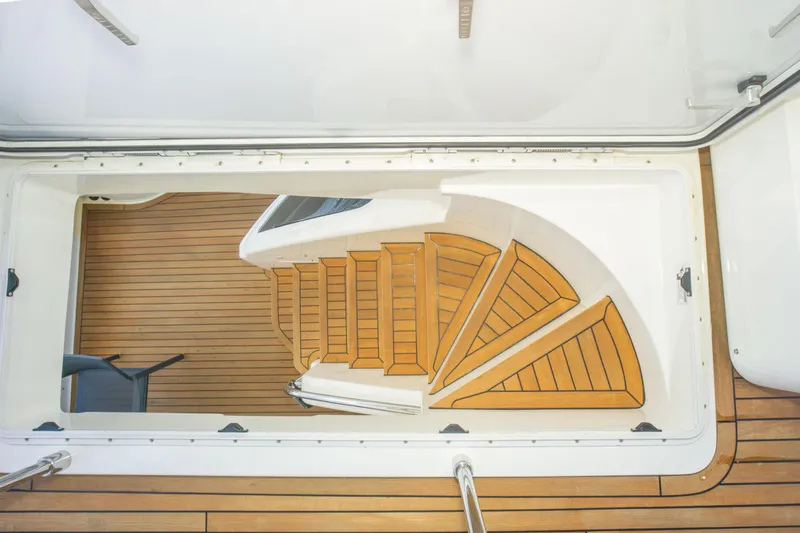  Yacht Photos Pics Staircase on 2015 Ferretti Yachts 750 with elegant wooden design and sleek finish.