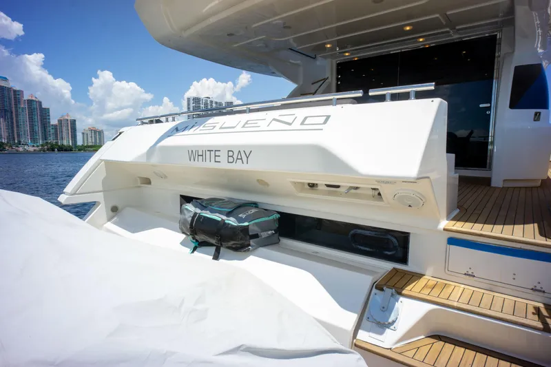 Yacht Photos Pics Ferretti Yachts 750, 2015 model, docked with city skyline in background.