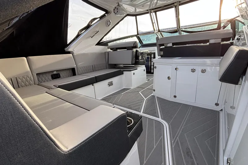  Yacht Photos Pics Interior of 2026 Monterey 385 Super Express yacht, featuring luxurious seating and modern design.