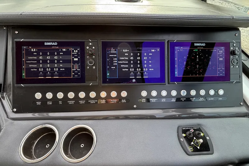  Yacht Photos Pics Dashboard of 2026 Monterey 385 Super Express with Simrad navigation displays.
