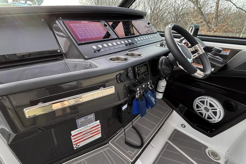  Yacht Photos Pics 2026 Monterey 385 Super Express helm with advanced controls and sleek design.