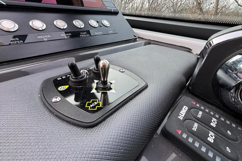  Yacht Photos Pics Control panel of 2026 Monterey 385 Super Express boat with switches and buttons.