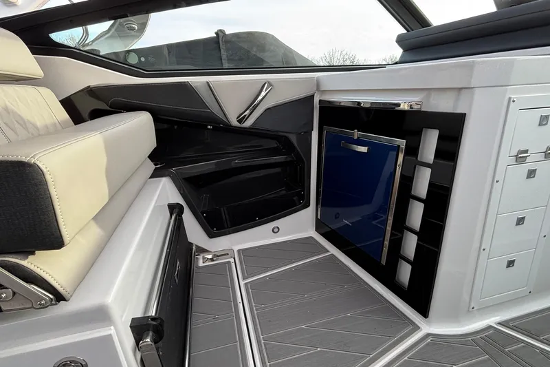  Yacht Photos Pics Interior of 2026 Monterey 385 Super Express boat with seating and storage features.