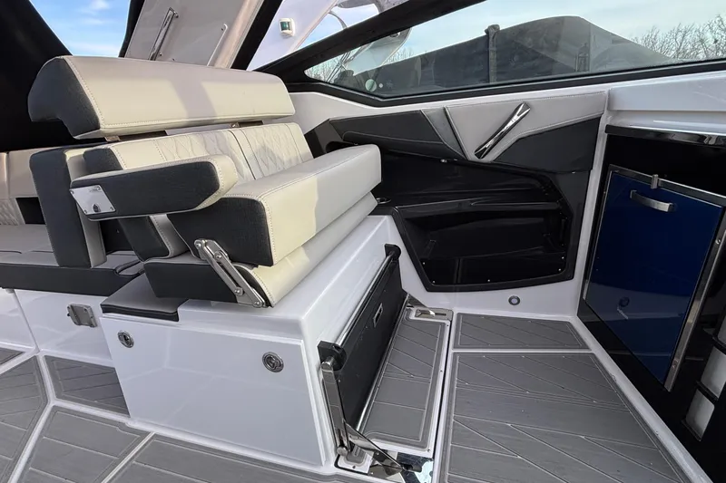  Yacht Photos Pics 2026 Monterey 385 Super Express interior with modern seating and sleek design.