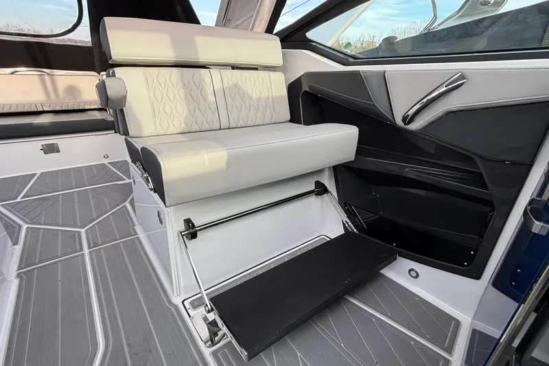  Yacht Photos Pics 2026 Monterey 385 Super Express interior with modern seating and sleek design.