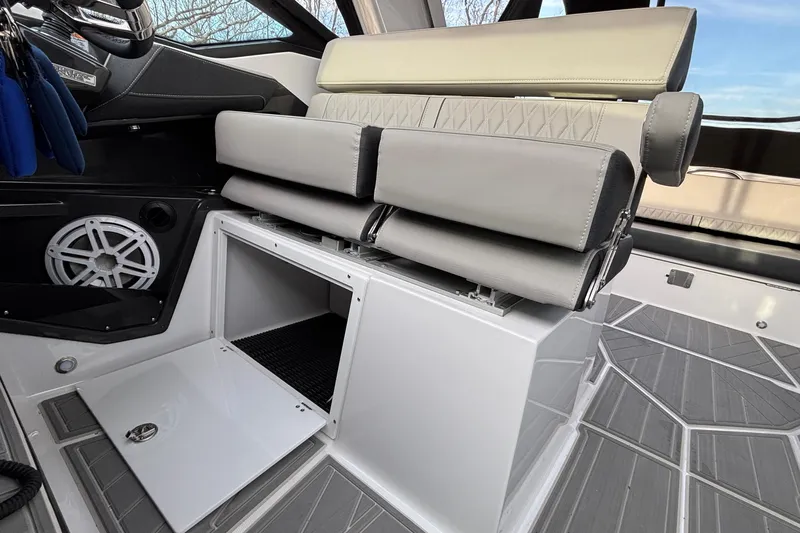  Yacht Photos Pics 2026 Monterey 385 Super Express interior with sleek seating and storage compartment.
