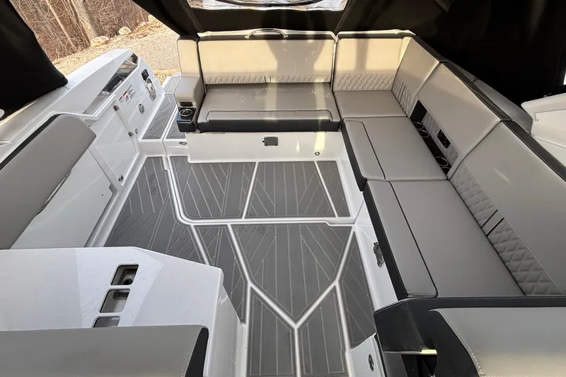  Yacht Photos Pics 2026 Monterey 385 Super Express boat interior with sleek seating and modern design.