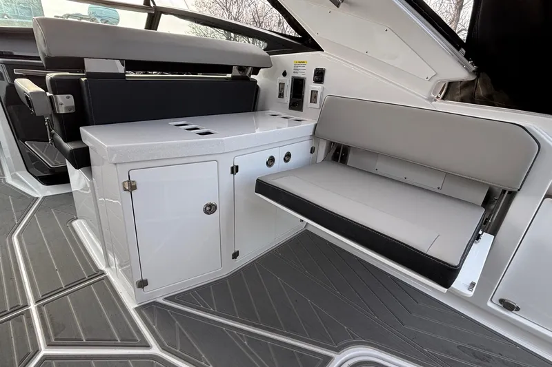  Yacht Photos Pics Interior of 2026 Monterey 385 Super Express boat with seating and storage.