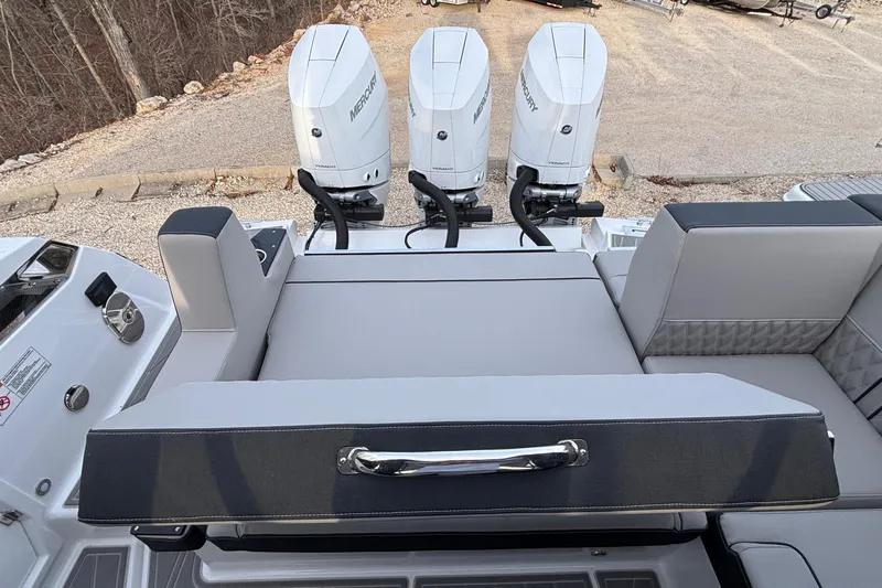  Yacht Photos Pics 2026 Monterey 385 Super Express boat with triple Mercury engines and luxurious seating.