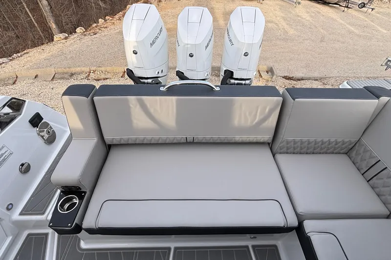  Yacht Photos Pics 2026 Monterey 385 Super Express boat with triple Mercury engines and luxurious seating.