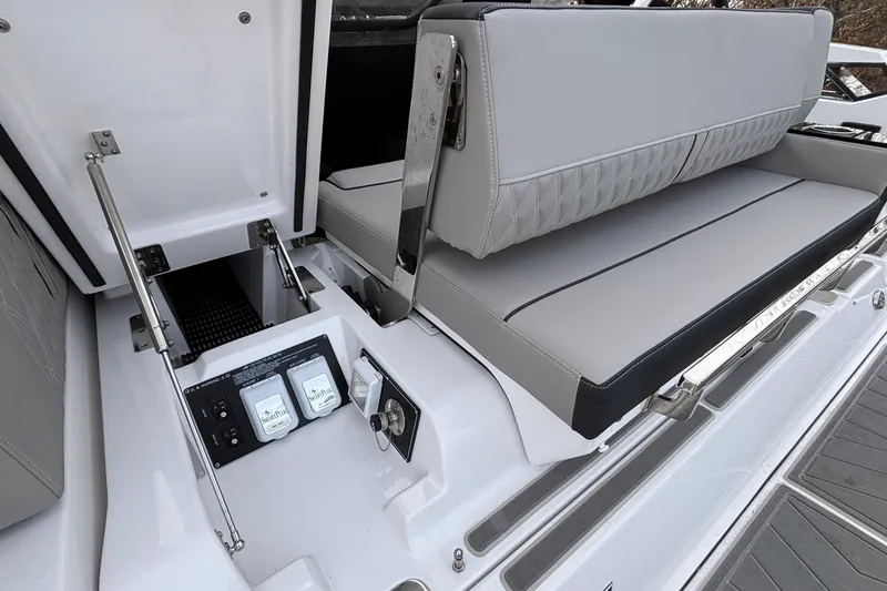  Yacht Photos Pics 2026 Monterey 385 Super Express yacht interior with sleek seating and control panel.