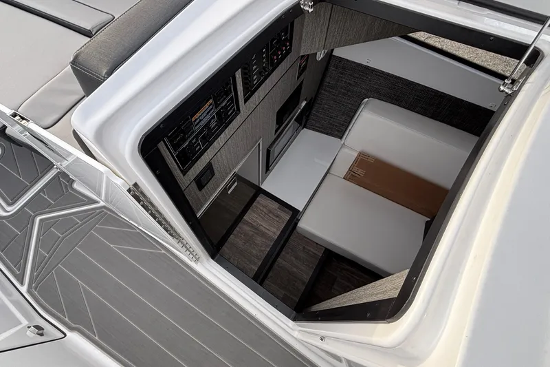  Yacht Photos Pics Interior view of 2026 Monterey 385 Super Express yacht cabin, featuring modern design and seating.