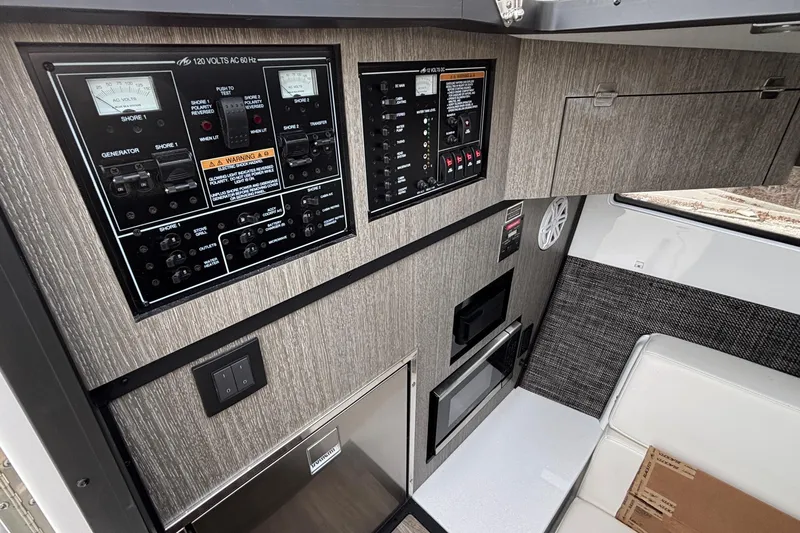  Yacht Photos Pics Control panel and interior of 2026 Monterey 385 Super Express boat.