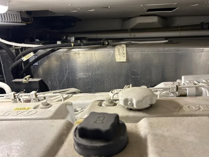  Yacht Photos Pics Engine room of 2003 Carver 466 Motor Yacht, featuring Volvo components and wiring.