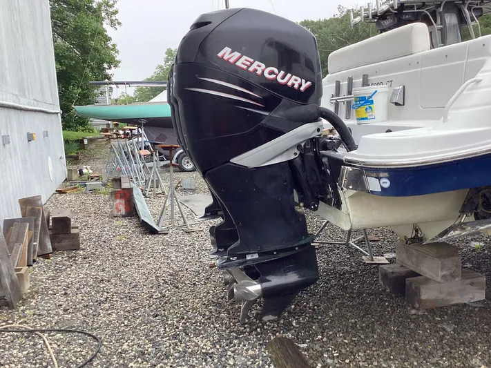  Yacht Photos Pics 2008 Donzi 38 ZSF with Mercury outboard engine on gravel lot.