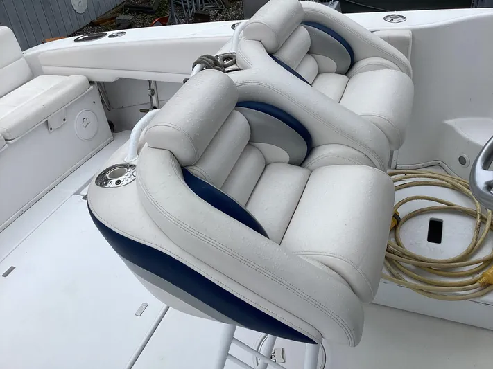  Yacht Photos Pics 2008 Donzi 38 ZSF boat interior with white and blue cushioned seats.