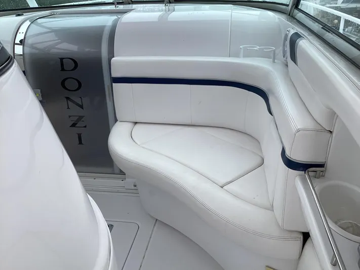  Yacht Photos Pics 2008 Donzi 38 ZSF boat interior with white seating and blue accents.