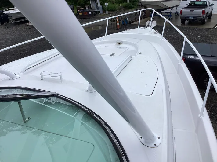  Yacht Photos Pics 2008 Donzi 38 ZSF boat deck with white railing and windshield.